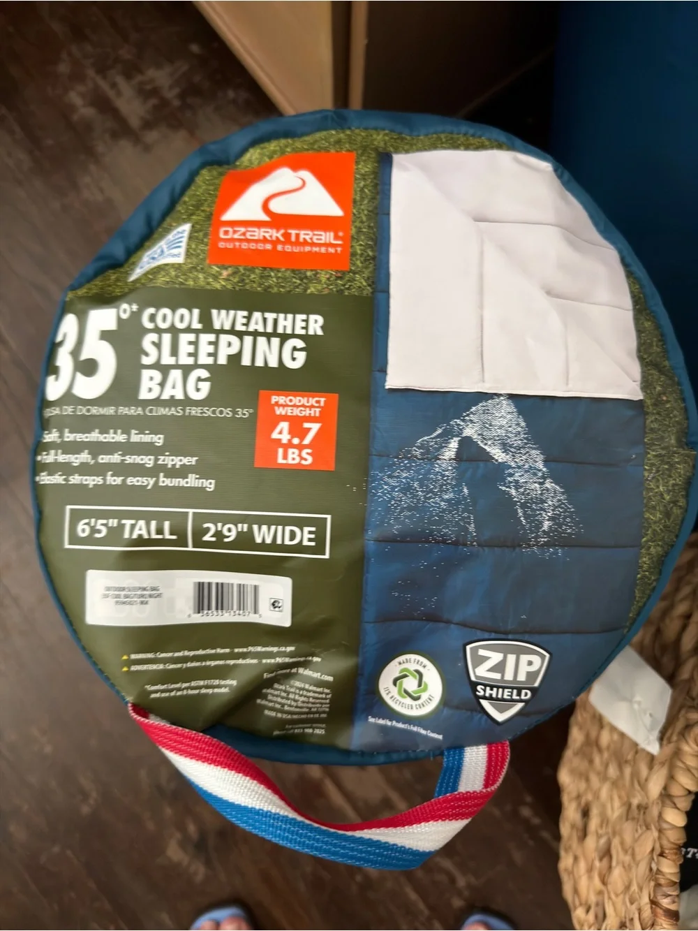 Ozark Trail Blue and White Sleeping Bag with Red, White & Blue Carry Handle